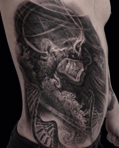 razor blade cutting skin tattoo